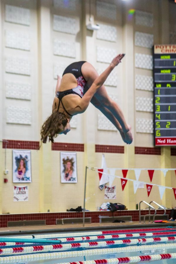 Senior Lauren Klinger performs a dive at the annual Schuylkill Leagues. This year Schuylkill Leagues were held at Pottsville’s Natatorium. “I had a lot of fun at leagues this year. I got to meet many new people and also was able to get a few tips from other divers,” said Klinger.  