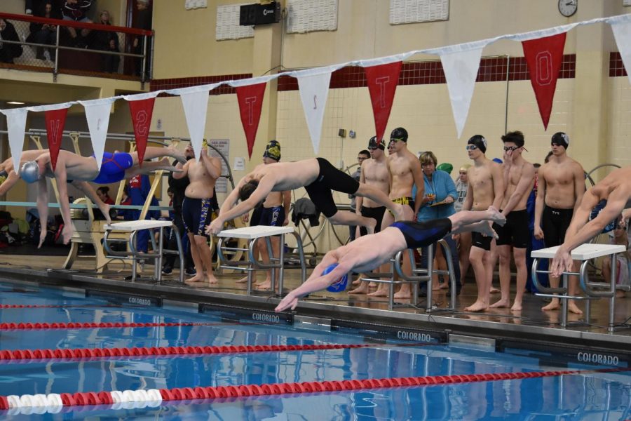 LAUNCH - At the start of the boys’ 400 free relay, senior Josh Zelinsky, middle, dives into the pool. The relay team of Zelinsky, juniors Zach Turnitza and Jordan Young and freshman Zaidian Vanorden set the record with a time of 3:28.8 at the Schuylkill Sprint meet held January 6 at the Ned Hampford Natatorium. “We are using setting the record to drive us to win districts. We all have been working very hard to get this,” Zelinsky said. “These accomplishments aren’t just for us - they’re for Coach Ned Hampford as well. He is the real motivation for our success.”
