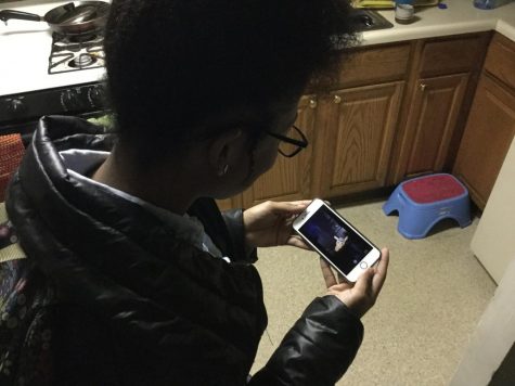 Freshman Tanya Johnson is watching the trailer for Detective Pikachu before school. The trailer was released on November 12 and will be coming out next summer.