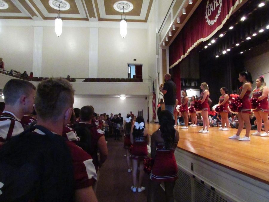 PAHS cheerleaders perform at the first pep rally. Some of the cheers they showed were “Give a Yell” and “Go Big Red.”  Senior Isabella Woodford [in the audience] said, “The pep rallies before the game are most memorable and one of the best parts of the week.” 