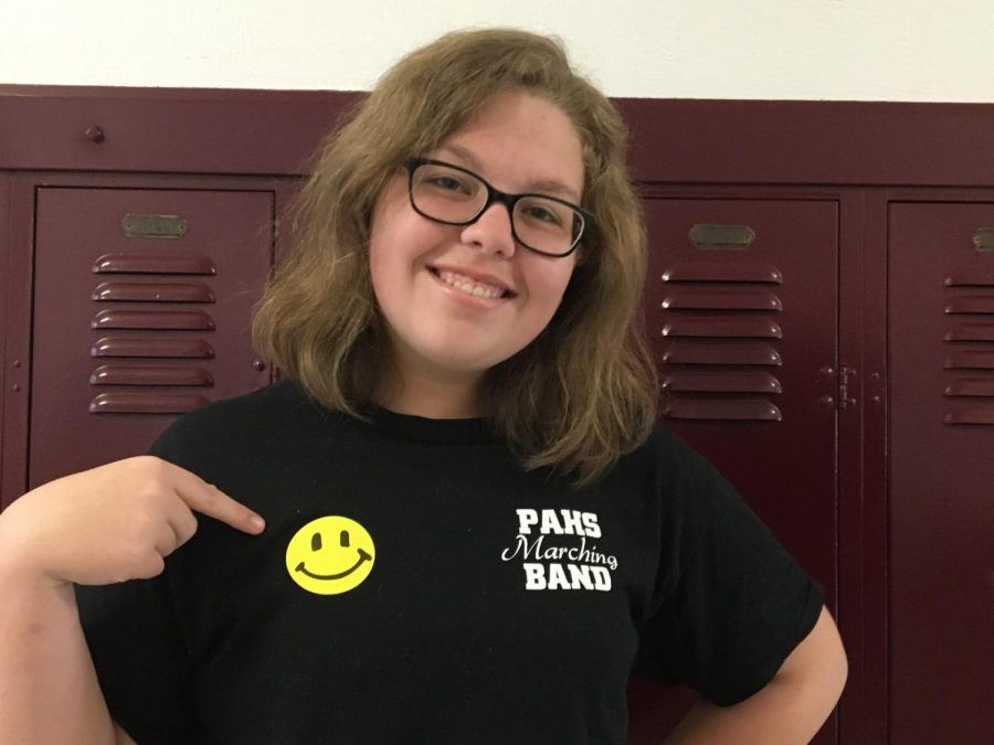 Freshman Emma Troutman wears her "Have a Nice Day" sticker with pride. Troutman received her "day" on the same day as the district-wide PBIS kickoff event. 