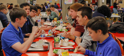 Featured students enjoy their Thanksgiving meal provided by the PAHS lunch staff. This lunch excited some students for the upcoming holiday. Sophomore Evan Woodward said, “I appreciate how the school adds variations to the lunches such as the Thanksgiving preview.”