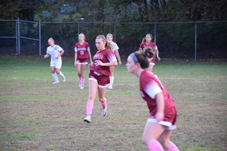 Senior Payton Tomlinson runs down field looking to make a play. She played for the PAHS soccer program all four years of her high school career. Tomlinson said, “The thing I will miss the most about high school soccer will be the team.  I have been playing soccer with some of these girls since second grade and it will be hard to leave that part of my life in the past. The soccer team was and will always be my family. I will miss seeing these girls everyday and creating memories on the field.”