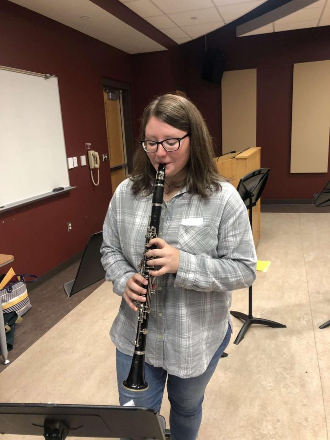 Junior Grace Mongrain, a clarinetist, is practicing the piece “Joy Revisited”. “Joy Revisited” was one of the two songs that the students played for their concert on November 18. “It felt pretty fantastic to be able to participate in this event and play with collegiate level musicians. My favorite part of the day was when we got to play in a mass ensemble with the Kutztown Wind Ensemble,” junior Grace Mongrain said. 