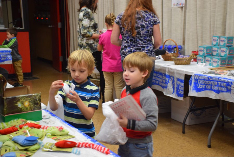 Two kindergarten students from Mrs. Joyce’s class browse for gifts for their friends and family. The Holiday Gift Shop began on December 4th and ended December 10th. Kindergarten student, Joseph Petrosky said, “My favorite part of Christmas is Santa bringing him presents.”