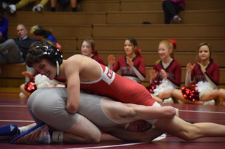Sam Sterns, sophomore at Nativity BVM, wrestles for the Pottsville Crimson Tide in a match against the Jim Thorpe Indians on Wednesday night. The Tide won against Jim Thorpe with a score of 49-24. Sterns said, “My big goal for the season was to have a better record. I want to be able to show my hard work and dedication.”