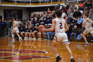 Senior Mason Barnes is  dribbling down the court scanning the floor for an open teammate. Barnes has been a varsity player since his freshman year. Barnes said, “I never want this season to end but when it does, we will definitely embrace the time we had as a team.”