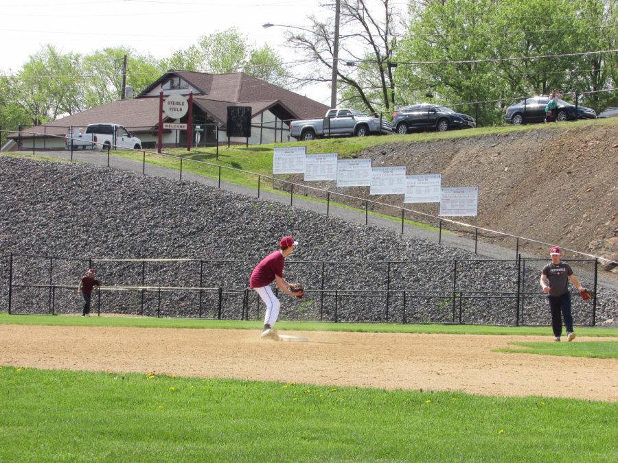 John Holobetz stands on second base preparing to catch any oncoming balls. The first official practice for spring sports began on March 2, 2020. “Being a senior, I try to be a supportive leader,” said teammate senior Damon Yost pictured at right. 