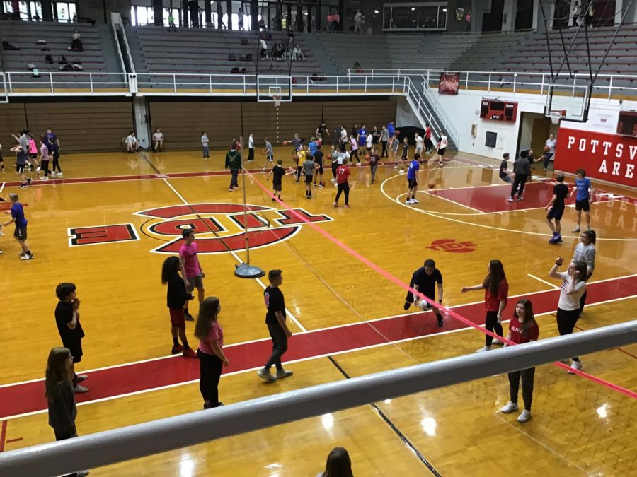 PLAY - Students participating in the gym activity during PBIS play basketball and volleyball on February 14.