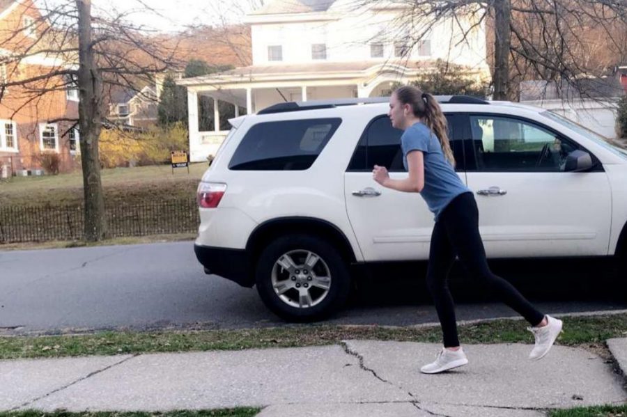 Freshman Madison Wright is running through her neighborhood to stay fit and active.