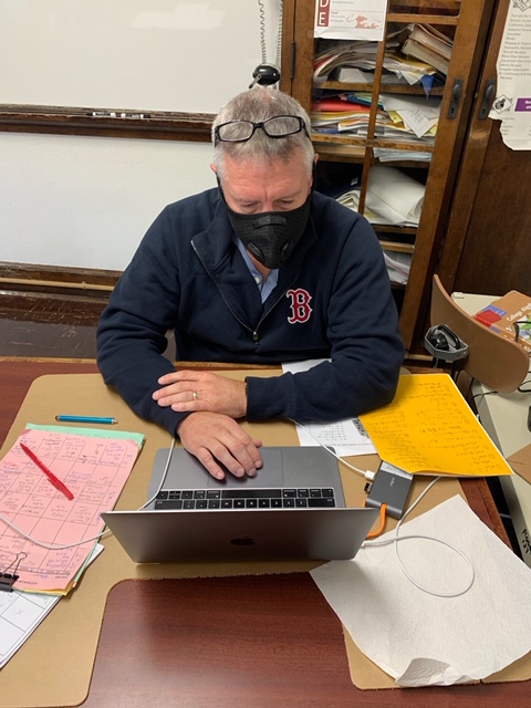 Mr. Sterner is taking safety precautions by wearing his mask while teaching class. Masks were made a requirement in order to enter the building at Pottsville Area. Mr. Sterner said, “The mask isn’t much of an issue but all the technology changes and having to wipe down the desk constantly.”