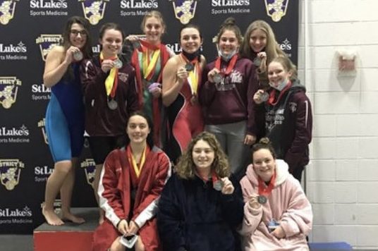 The girls swim team stands proud on the podium knowing they made history as the first district runner ups. Overall the girls scored a 242 in the team event. Katie Painter says, “Being able to compete in districts was a great experience. With the new change, came more opportunities to swim and compete and allowed for a really wonderful day packed with many memories.”