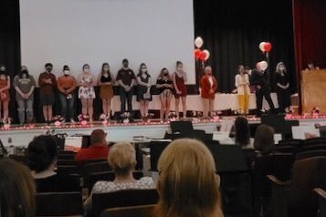 Senior band members stand on the stage as they are receiving their gift. This year they were given portable chargers with “PAHS 2021” on it. Senior Jake Montgomery comments on the event saying, “We did a nice farewell video and award ceremony for all the seniors.”