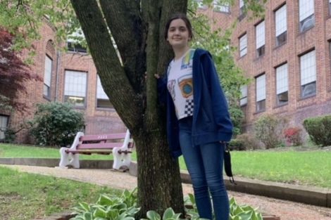 Sophomore Rene Keiter stands near a tree to celebrate Earth Day. Many students at PAHS honor the earth by not littering and making small changes to help the environment. Rene said “ I think the significance of Earth Day is a day to recognize the importance of the planet.“