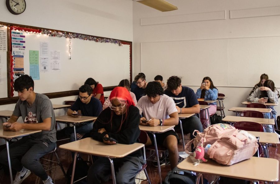 Senior students sit in the homeroom awaiting starting their first classes. Recently, students conveyed that they had struggled with the feeling of being overwhelmed and stressed.