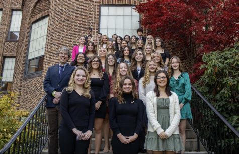 The juniors and seniors celebrated their hard work with the N.H.S ceremony. The National Honors Society inductees and this years speaker Mr. Smink stand on the courtyard steps for a group photo.