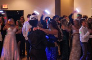 Prom King Parrish McFarland and Queen Gwen Biddle dance the night away. The two slow dance in the middle of the dancefloor in Saint Nicholas Hall.
