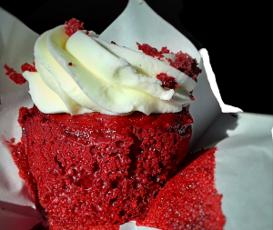 There are a variety of flavors that Sughr has to offer. Pictured, is a red velvet cupcake filled with cream cheese and topped with cream cheese frosting.