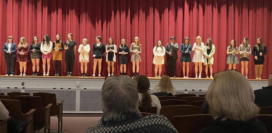 The French nominees walk up onto the stage and await their ceremony. The family and friends of the French 3 and French 4 students watch as they get inducted into the National Foreign Language Honor Society. 