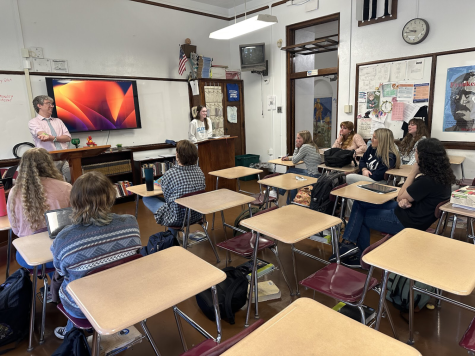 Mr. Smink is reviewing with his AP Lang. class on what to expect on the AP Language and Composition test.  The AP Language and Composition test will consist of material that was taught throughout the class, along with writing prompts for students. 