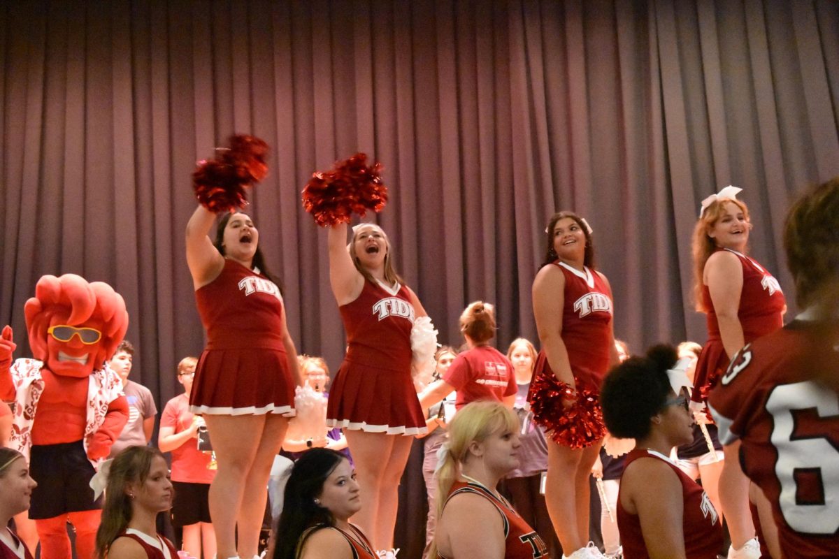 Cheerleaders, Tessa Nelson and Aspen Robbins are hyping up the juniors for their class cheer. Kylie Morris and Annabella Chaklos stand by for the seniors’ cheer.