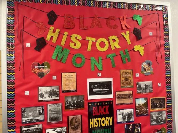 Black history month mural found in the lunch room. The piece is decorated with important black figures. Mural was put up by Diversity Club members.