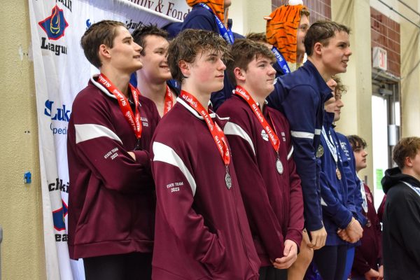 Noah Bevan, Jamison Walsh, Vincent Prestillio, and Killian Bressler received their medals and stood proud of their accomplishments.