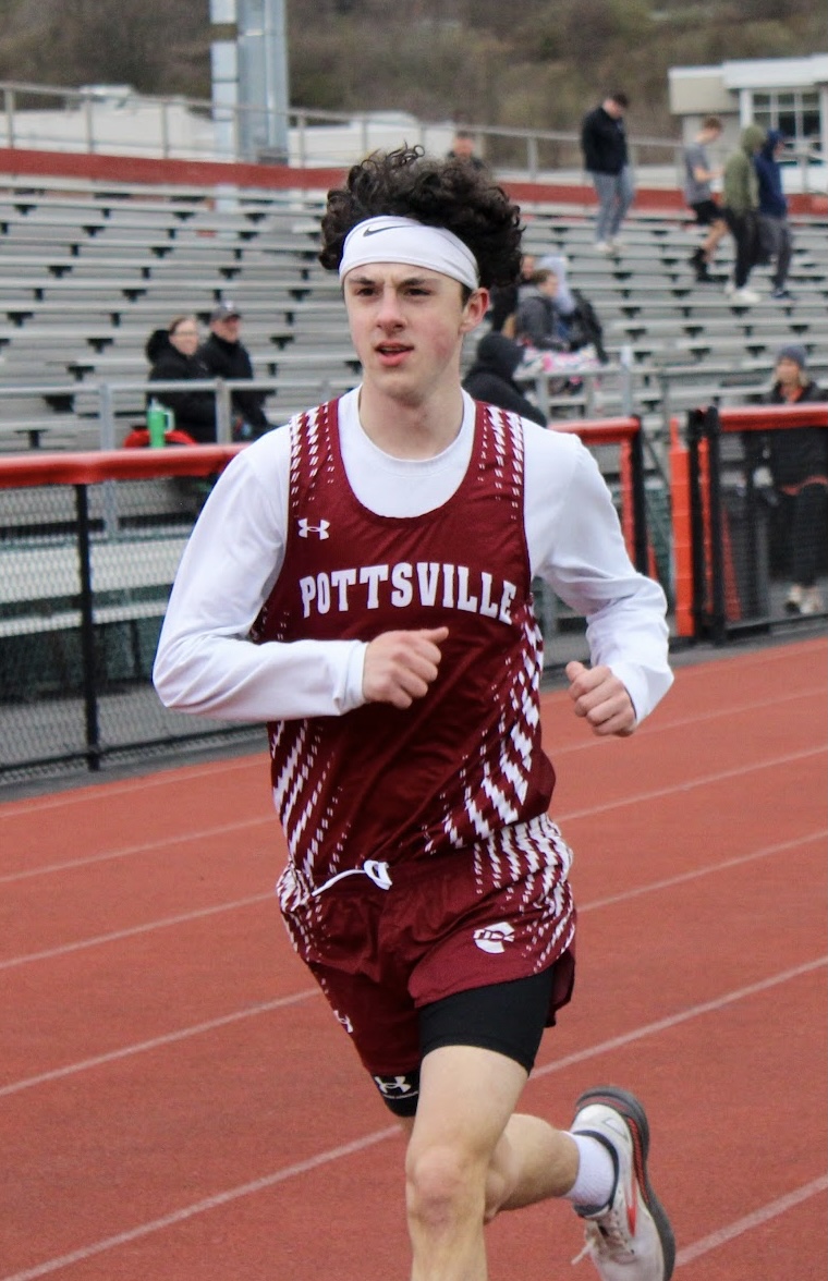 Cullen Clarke hitting the track running to get ahead in the Pine Grove meet in Spring of 2024.