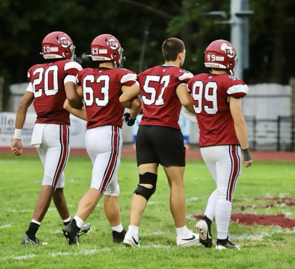 The captain's Tsirell Curry, Luke Shane, Ryan Galen, and Brayden Evans (left to right) walk out to meet Jim Thorpe captains before their game. The team went on to win this game by a blowout score of 48-7.
