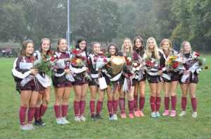 Lady Tide Soccer honored with flowers. From left to right, Abbie Davis, Aubrey and Hadley Snyder, Lauren Goodman, Emma Adams, Trinity Mendofik, Kailey Olenick, Lauren Kelly, Brooke Palko, Camille Quirin-Morris, and Aubrey Scanlan.