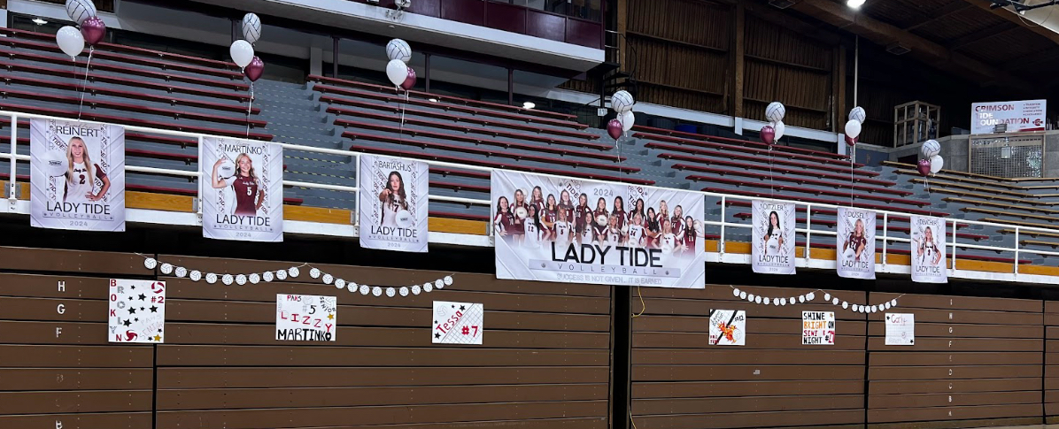 Volleyball seniors are honored with banners. “Senior night was such a special experience not only for me, but for my other teammates that I've had the privilege to play with for the past seven years,” senior Lizzy Martinko said. 
