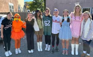 Pottsville’s majorettes dress up for the New Philadelphia parade. “My favorite part of these parades are our group costumes, it’s really fun seeing us all be creative and dress up. This year we all dressed up as grandmas, which was funny and different from what we normally do.” junior Jes Siminitus said. 
