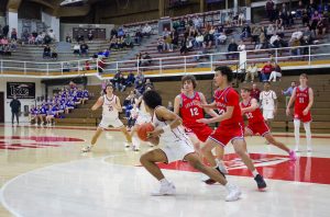 Senior Letrel Montone drives and looks to make a pass to Junior Christian Alvarez. This game was against North Schuylkill last year in one of the many thrillers of a trilogy.
