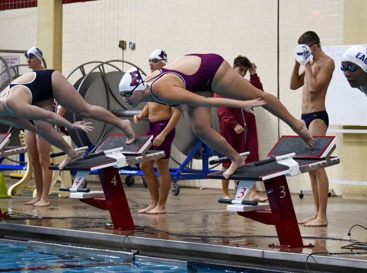 Adalia LaSelva dives off the block to start off her race. She swam the 100 butterfly in this event and won it. 
