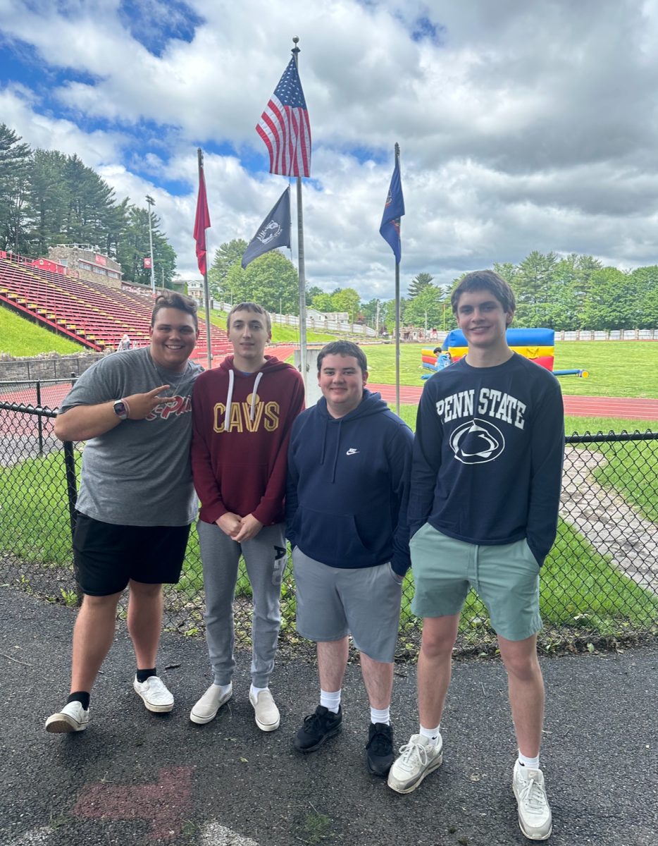 Dominic Zembas (12), Carter Strouse (12), Ryan Devine (11), and Grady Leskin (11), helped out cleaning the Crimson Carnival after it was finished. Other members of the National Honors Society helped clean up as well.
